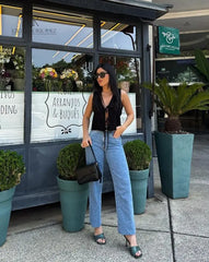 Blusa versátil negra, ideal para combinar con jeans o falda, moda femenina KIKE RODRIGUEZ.