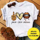 Camiseta blanca con diseño dorado de "Peace Love Melanin", en promoción especial de 3 por $129,900 en KIKE RODRIGUEZ. Ideal para expresar estilo y un mensaje positivo.