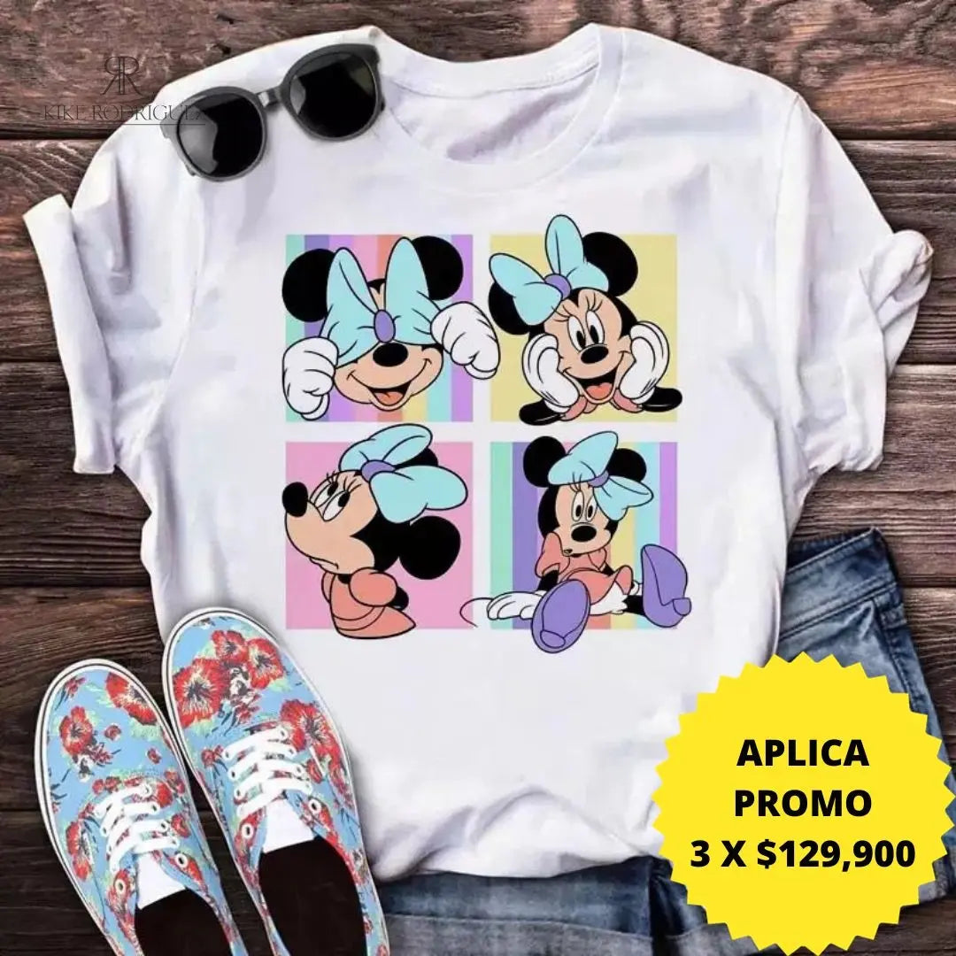 Camiseta blanca con diseño de Minnie Mouse y lazos de colores. Ideal para un look divertido y casual. Disponible en promoción de 3 por $129,900 en KIKE RODRIGUEZ. Compra ahora y luce espectacular.