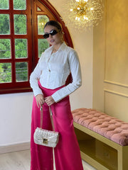 Pantalón color fucsia para mujer, perfecto para un look vibrante y moderno.