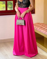 Pantalón palazzo color fucsia para mujer, ideal para un look sofisticado y moderno.