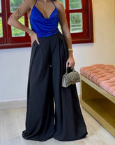 Pantalón palazzo color negro para mujer, ideal para un look moderno y refinado.