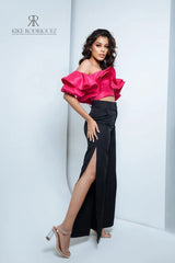 Pantalón negro con abertura lateral para mujer, ideal para un look moderno y elegante.