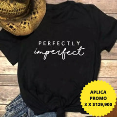 Camiseta negra con diseño blanco de "Perfectly Imperfect", en promoción especial de 3 por $129,900 en KIKE RODRIGUEZ. Ideal para expresar tu estilo único y auténtico.